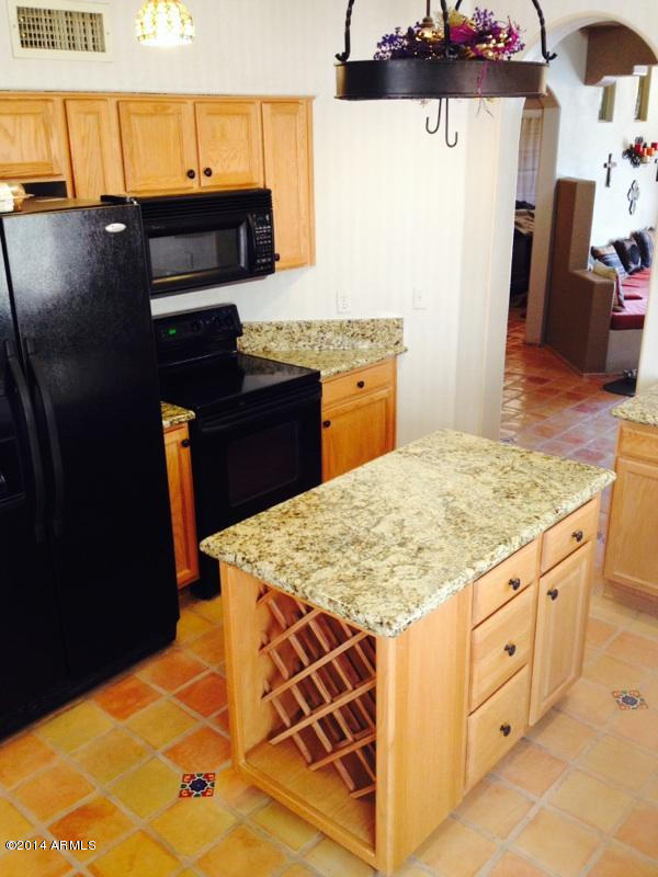 1135 East Frye Road Phoenix, AZ 85048 - Photo 7 of 60 Another view of kitchen,hanging pot rack