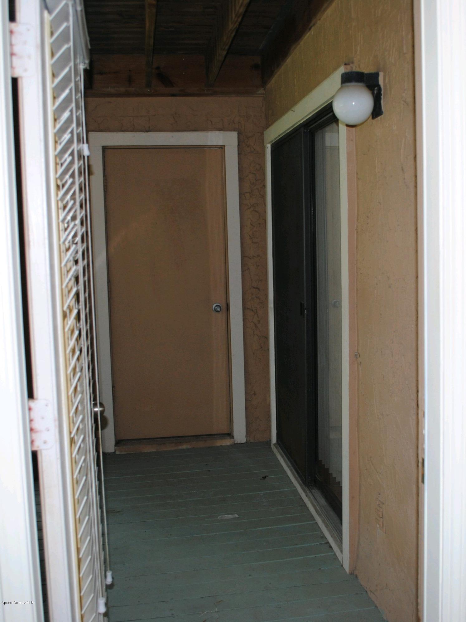 7667 North Wickham Road, Unit 812 Melbourne, FL 32940 - Photo 11 of 17 a view of front door