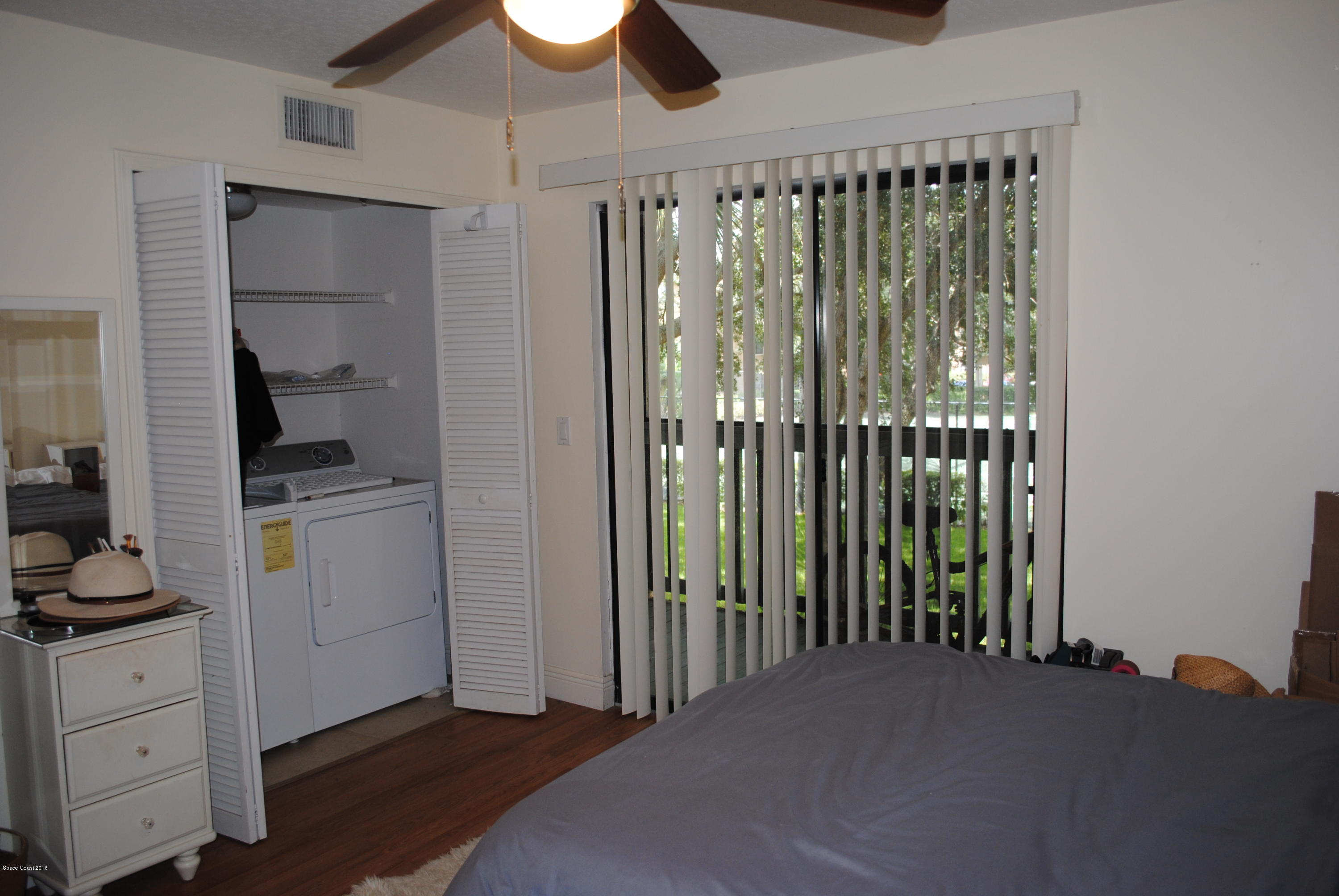 7667 North Wickham Road, Unit 812 Melbourne, FL 32940 - Photo 10 of 17 a view of a utility room with closet and windows