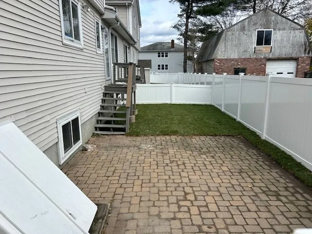 a house view with a garden space