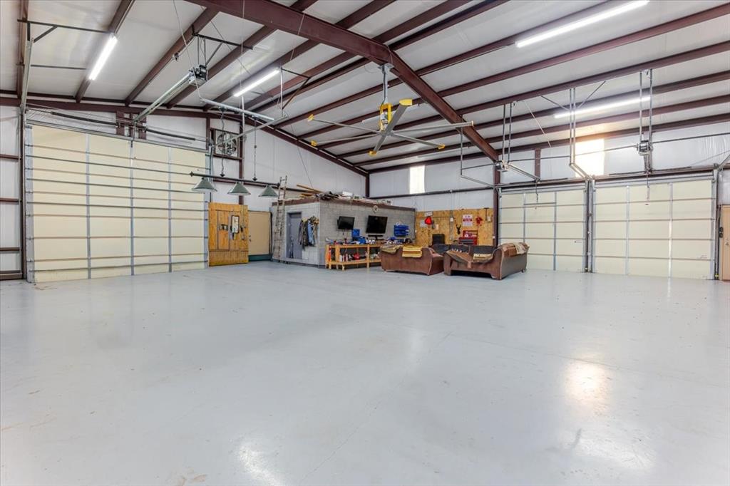 2117 Highway 6 Cisco, TX 76437 - Photo 21 of 35 a view of a garage with storage