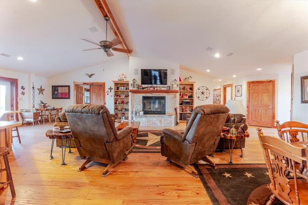 2117 Highway 6 Cisco, TX 76437 - Photo 10 of 35 a living room with furniture and a fireplace