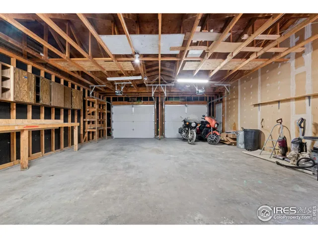 a view of a bike storage and utility room