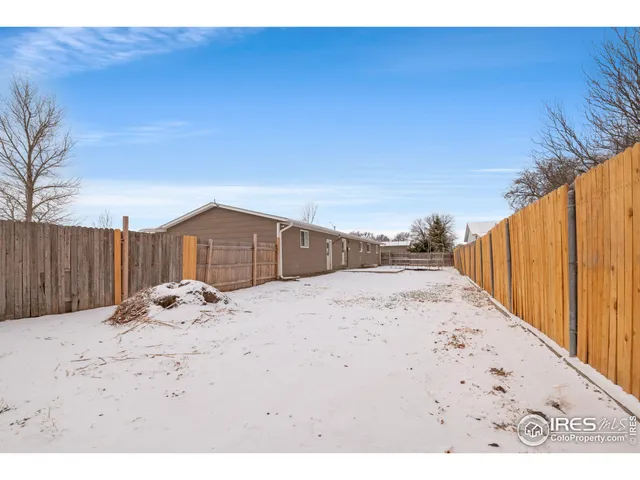 a view of a backyard of a house