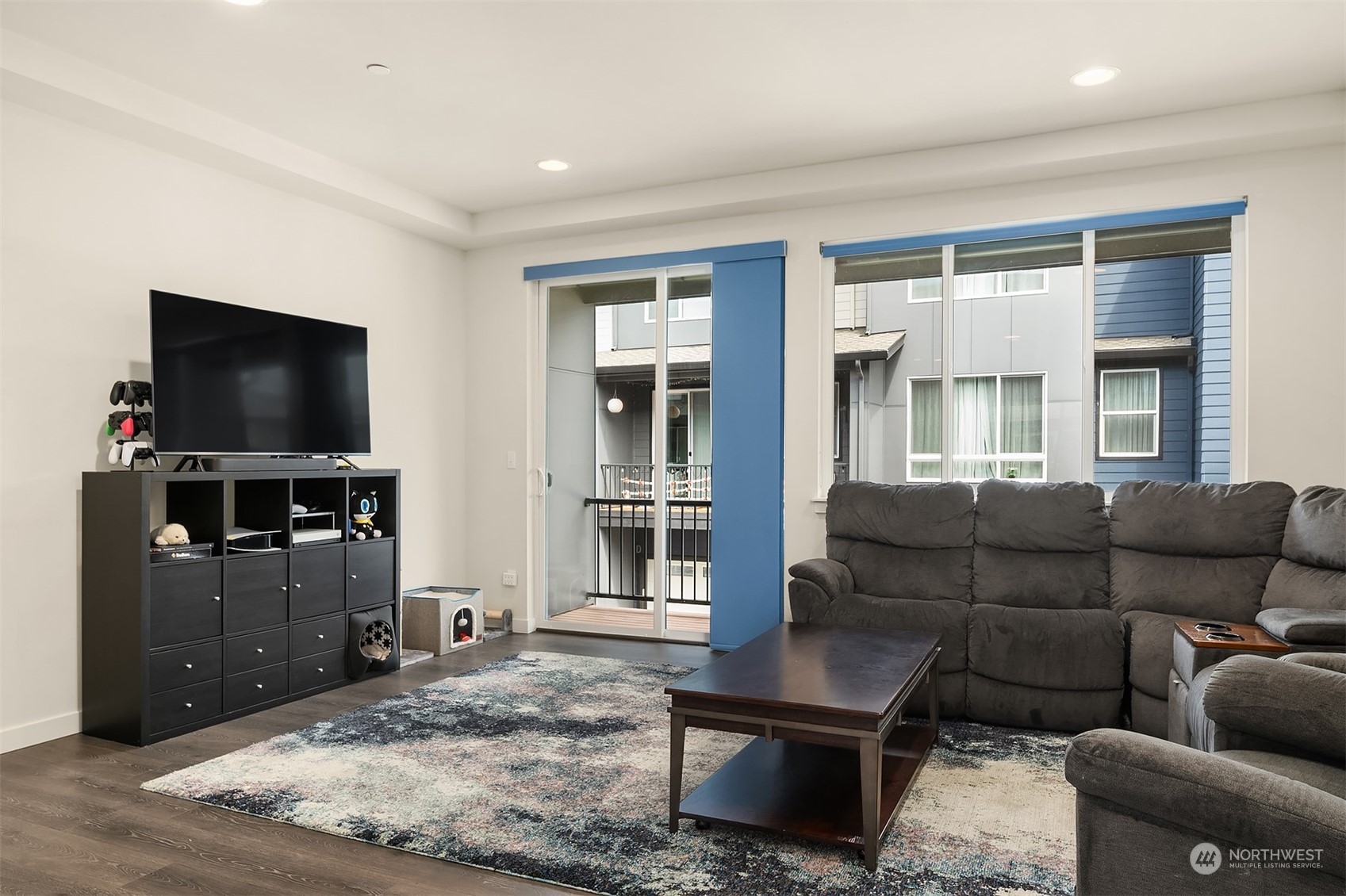616 237th Place Southeast, Unit B Bothell, WA 98021 - Photo 15 of 33 a living room with furniture and a flat screen tv