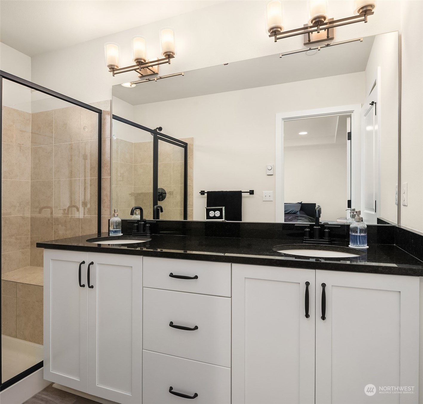 616 237th Place Southeast, Unit B Bothell, WA 98021 - Photo 22 of 33 a bathroom with a sink and a mirror