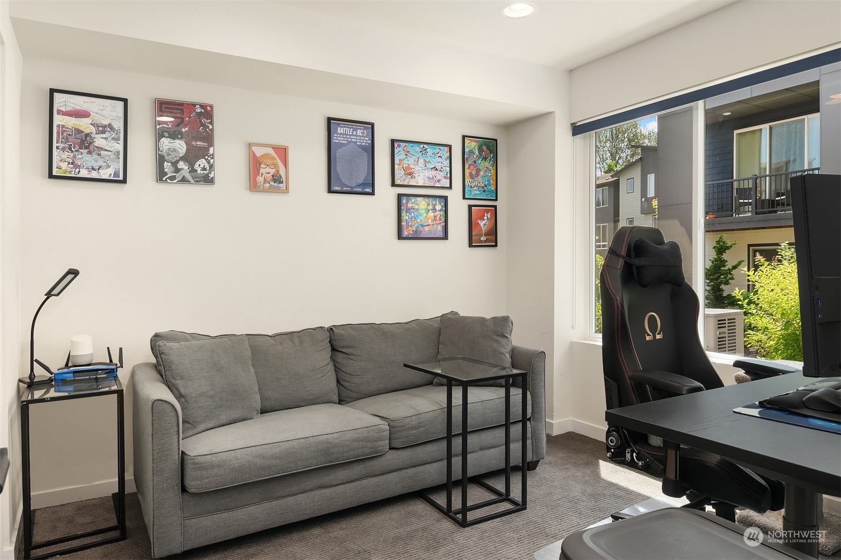616 237th Place Southeast, Unit B Bothell, WA 98021 - Photo 27 of 33 a living room with furniture and a window