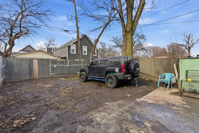 a car parked in front of a house