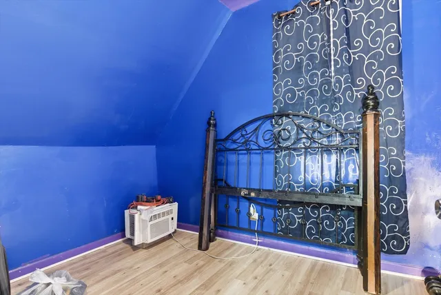 a view of wooden staircase and a rug