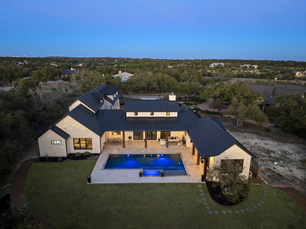 a view of a house with a big yard