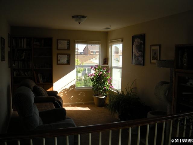 8931 Grisom Way Reno, NV 89506 - Photo 11 of 13 a view of balcony with a potted plant