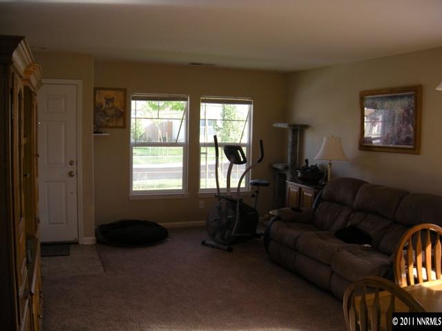 8931 Grisom Way Reno, NV 89506 - Photo 3 of 13 a living room with furniture and a window