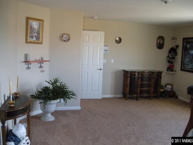 8931 Grisom Way Reno, NV 89506 - Photo 8 of 13 a view of livingroom with furniture and potted plant