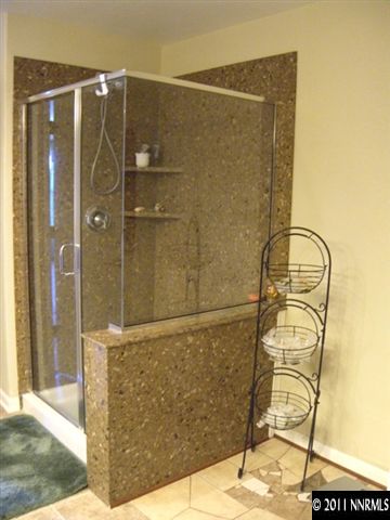 8931 Grisom Way Reno, NV 89506 - Photo 9 of 13 a bathroom with a shower