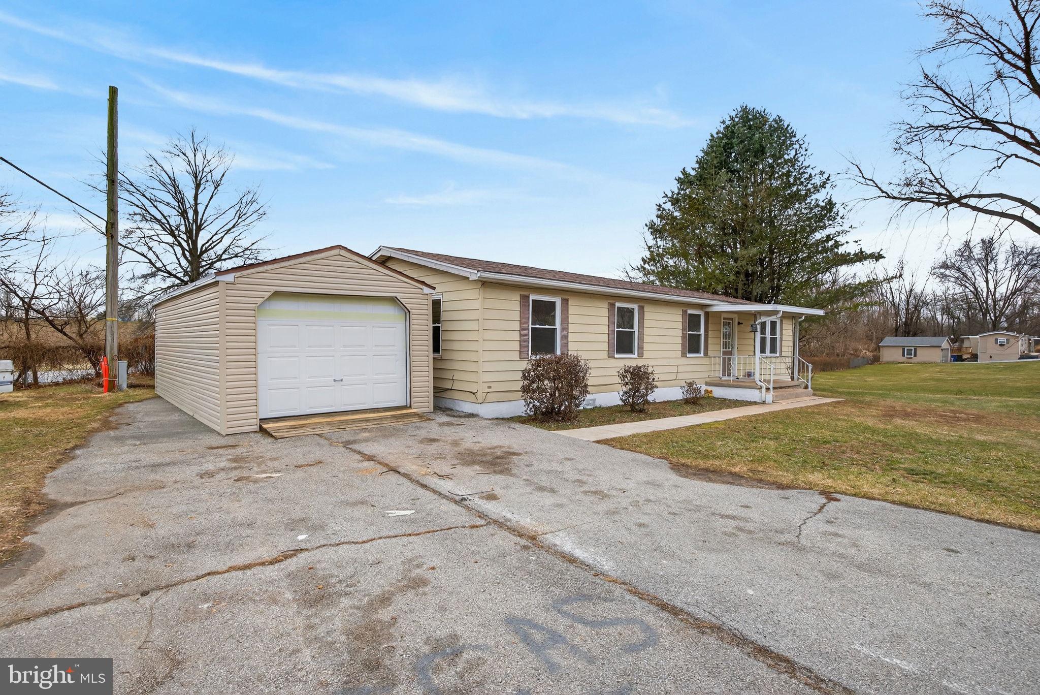 4918 Pleasant Valley Road York, PA 17406 - Photo 2 of 30 a house with a outdoor space