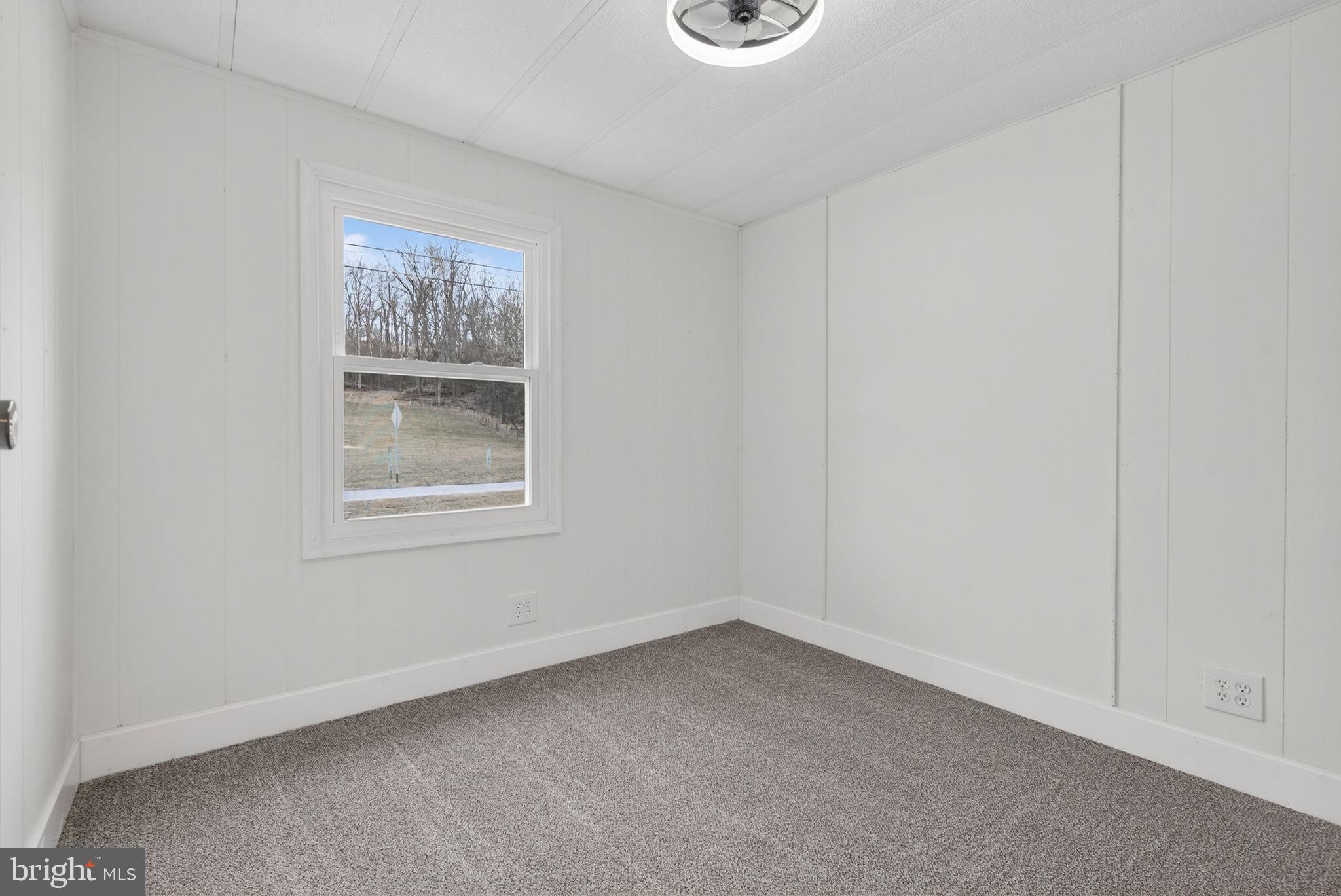 4918 Pleasant Valley Road York, PA 17406 - Photo 22 of 30 a view of an empty room with a window