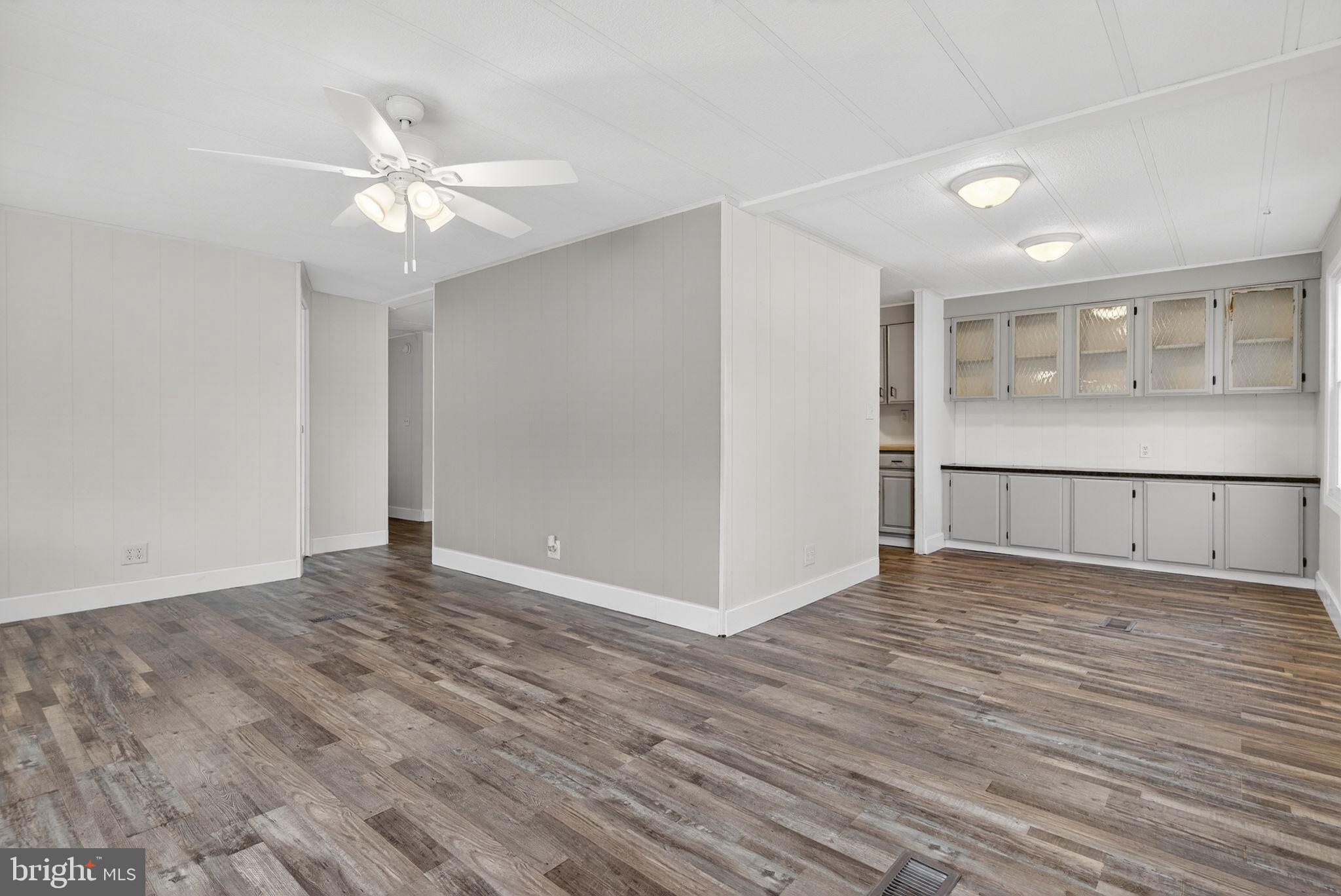 4918 Pleasant Valley Road York, PA 17406 - Photo 6 of 30 a view of an empty room with wooden floor and a window