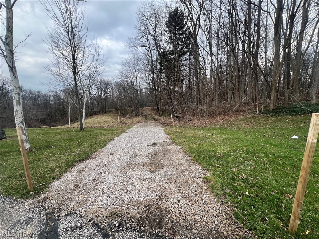 691 Som Center Road Cleveland, OH 44143 - Photo 5 of 37 Gravel area on drive to park when viewing