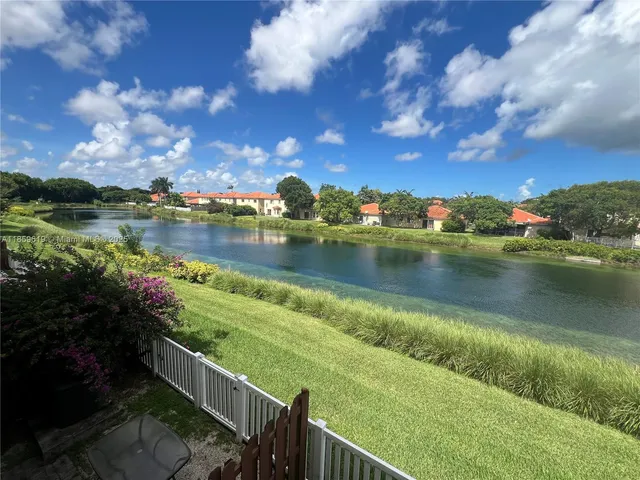a view of a lake with a city