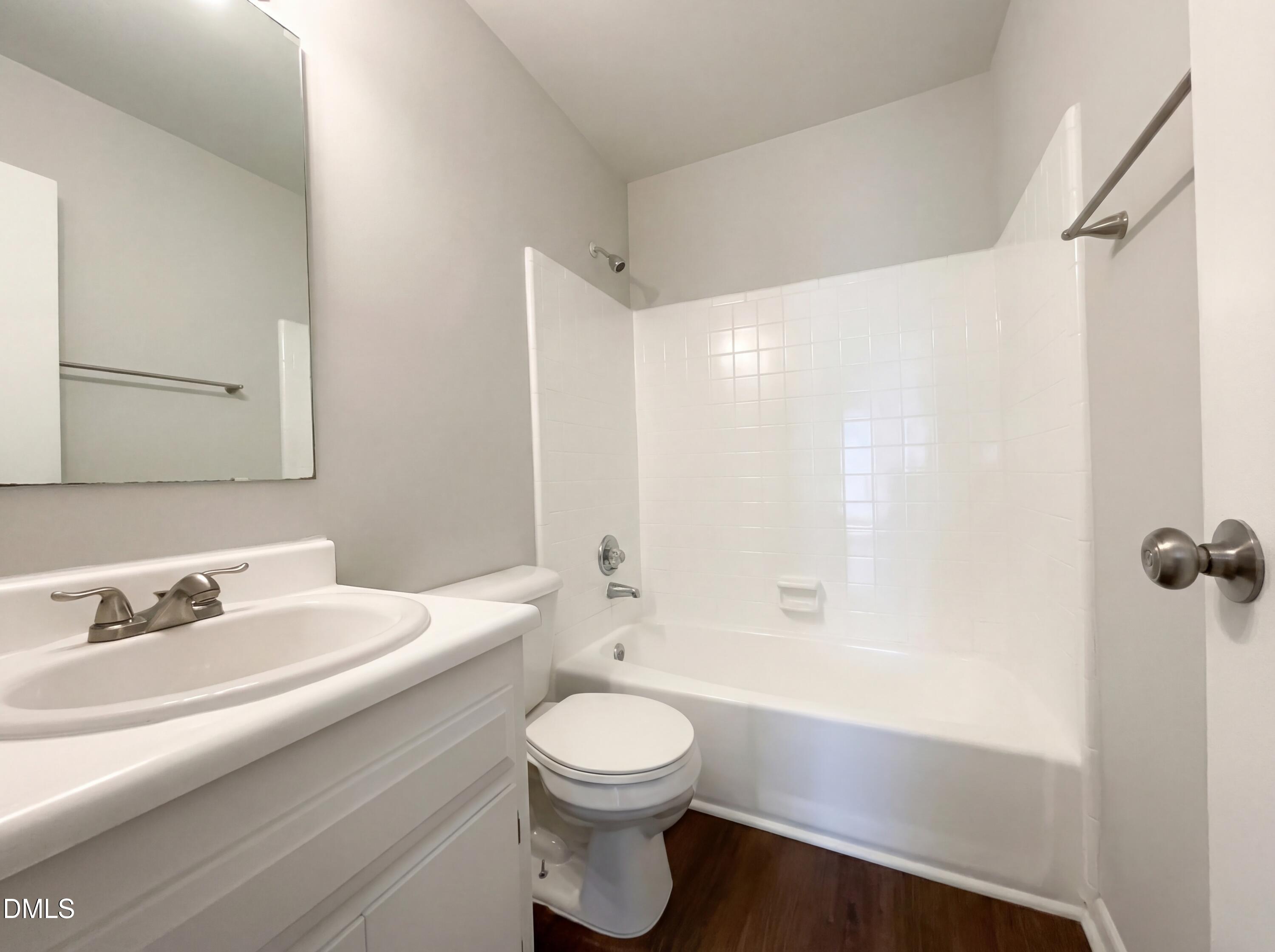 4113 Mill Bridge Road Hope Mills, NC 28348 - Photo 16 of 18 a bathroom with a sink a toilet and shower