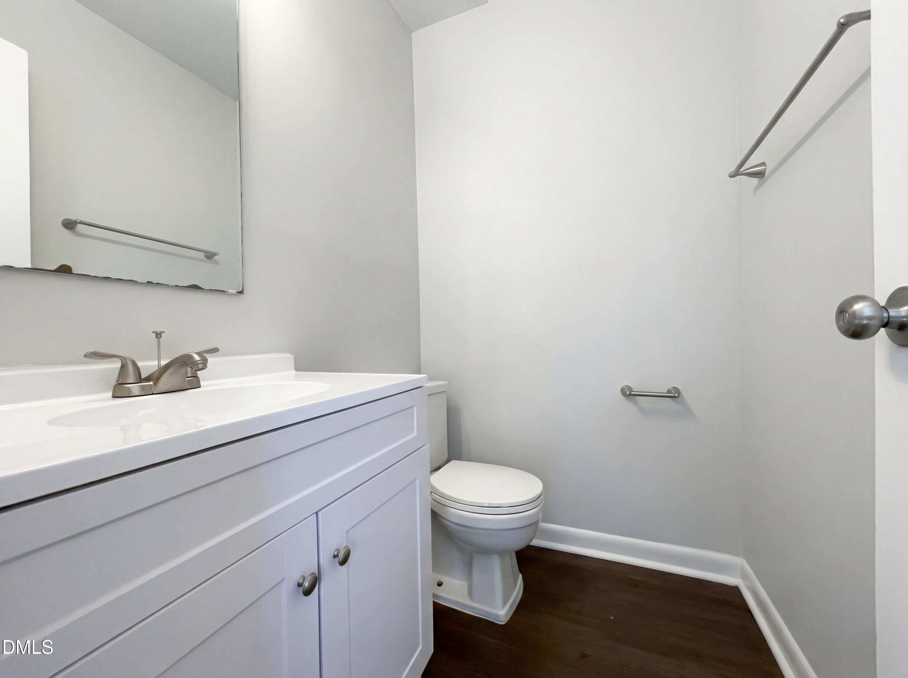 4113 Mill Bridge Road Hope Mills, NC 28348 - Photo 17 of 18 a bathroom with a sink and a toilet