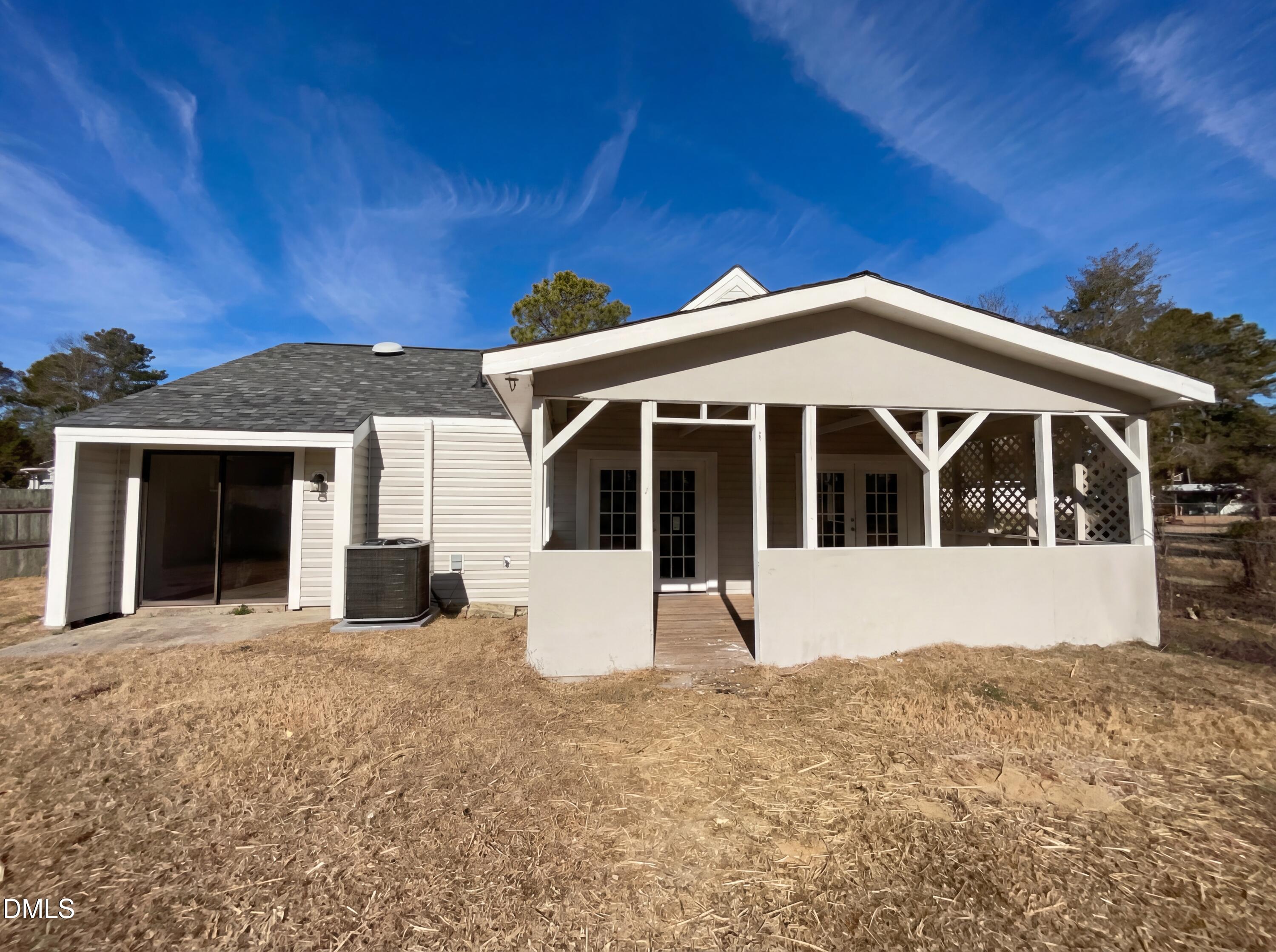 4113 Mill Bridge Road Hope Mills, NC 28348 - Photo 18 of 18 a front view of a house with a yard