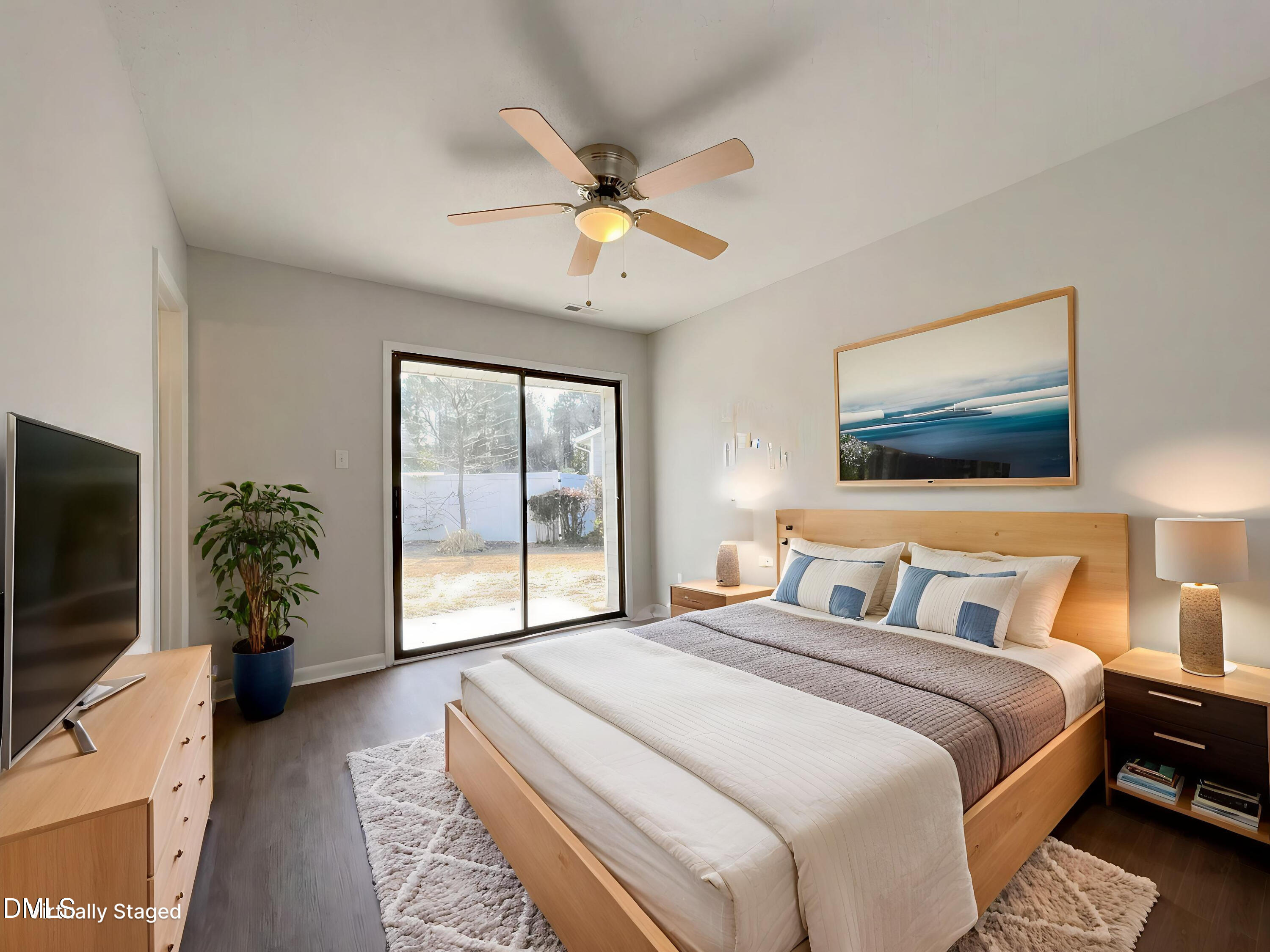 4113 Mill Bridge Road Hope Mills, NC 28348 - Photo 9 of 18 a bedroom with a large bed and a flat screen tv