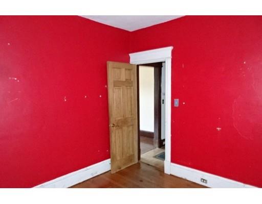 126 Jasper Street Springfield, MA 01109 - Photo 8 of 14 a view of a red door and chair