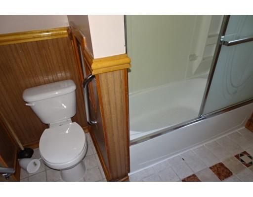 126 Jasper Street Springfield, MA 01109 - Photo 9 of 14 a bathroom with a toilet and a shower