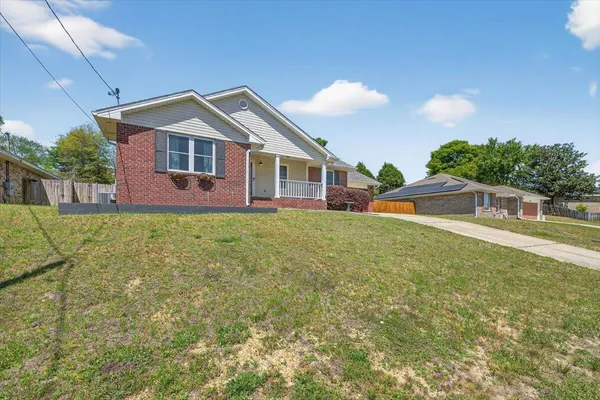 a picture of a bathroom with a shower