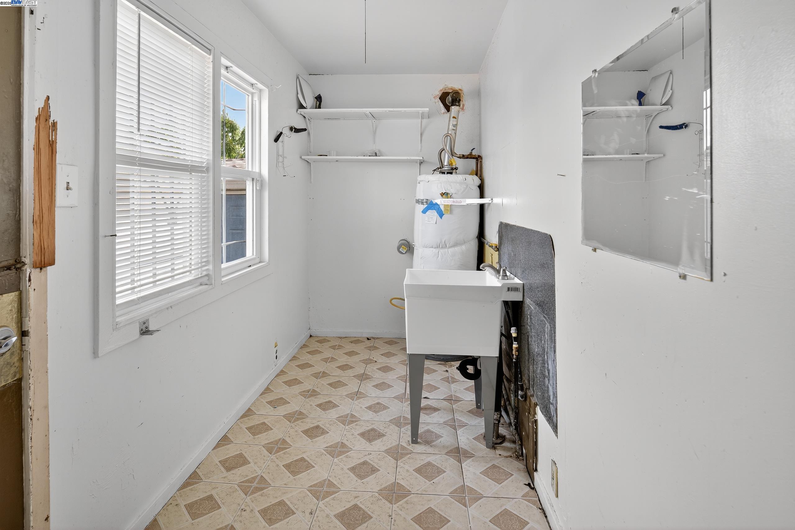 7412 Weld Street Oakland, CA 94621 - Photo 14 of 19 a view of kitchen with breakfast area