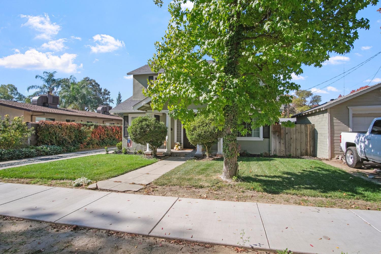 525 Semple Street Modesto, CA 95354 - Photo 3 of 38 a front view of a house with garden