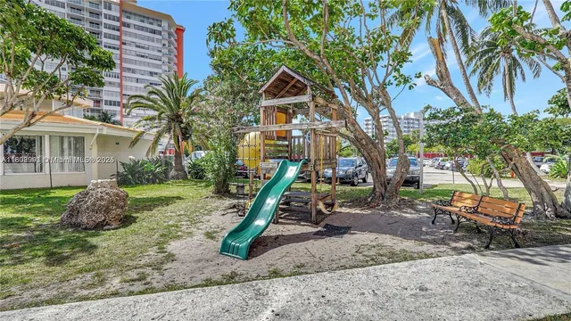 a front view of a house with backyard