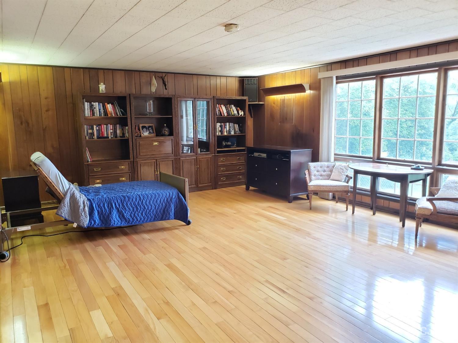 33 Tunison Road New Brunswick, NJ 08901 - Photo 15 of 27 a living room with furniture lamps and wooden floor