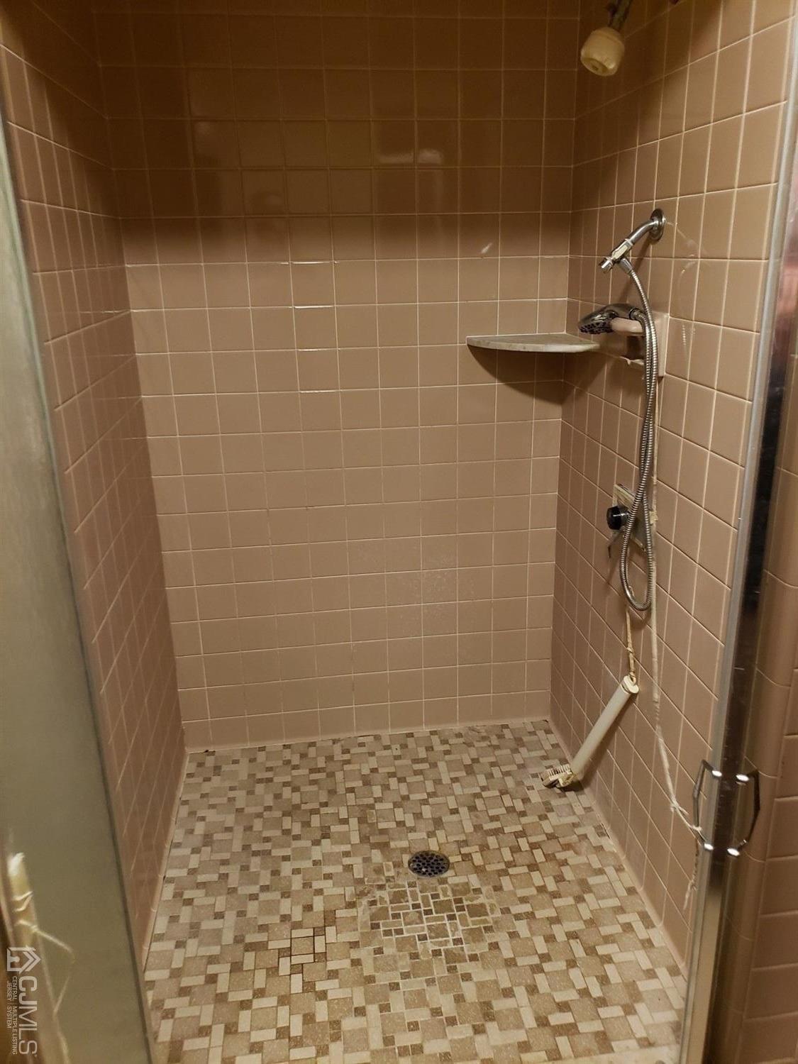 33 Tunison Road New Brunswick, NJ 08901 - Photo 18 of 27 a bathroom with a shower