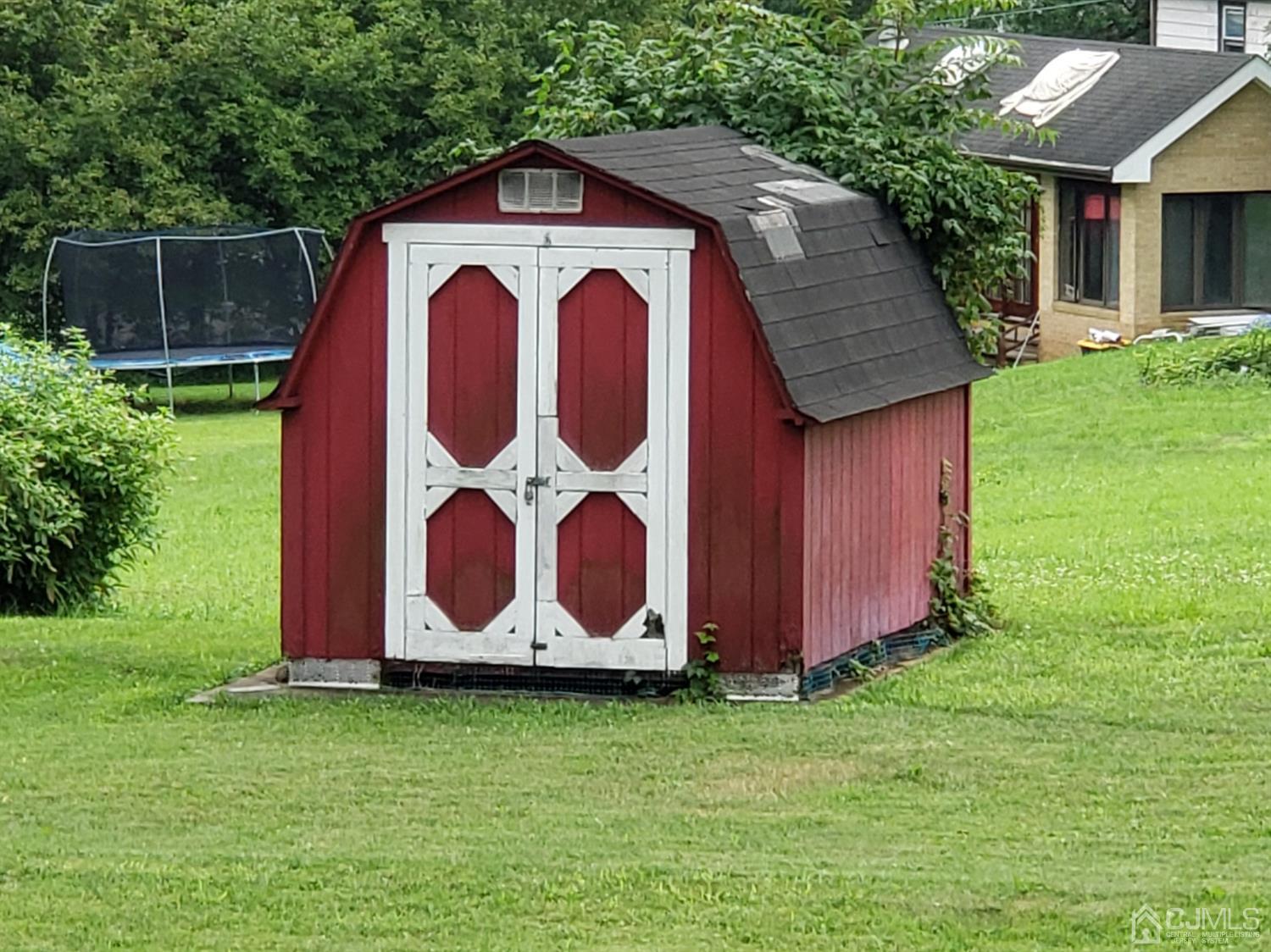 33 Tunison Road New Brunswick, NJ 08901 - Photo 26 of 27 a view of a barn with a yard