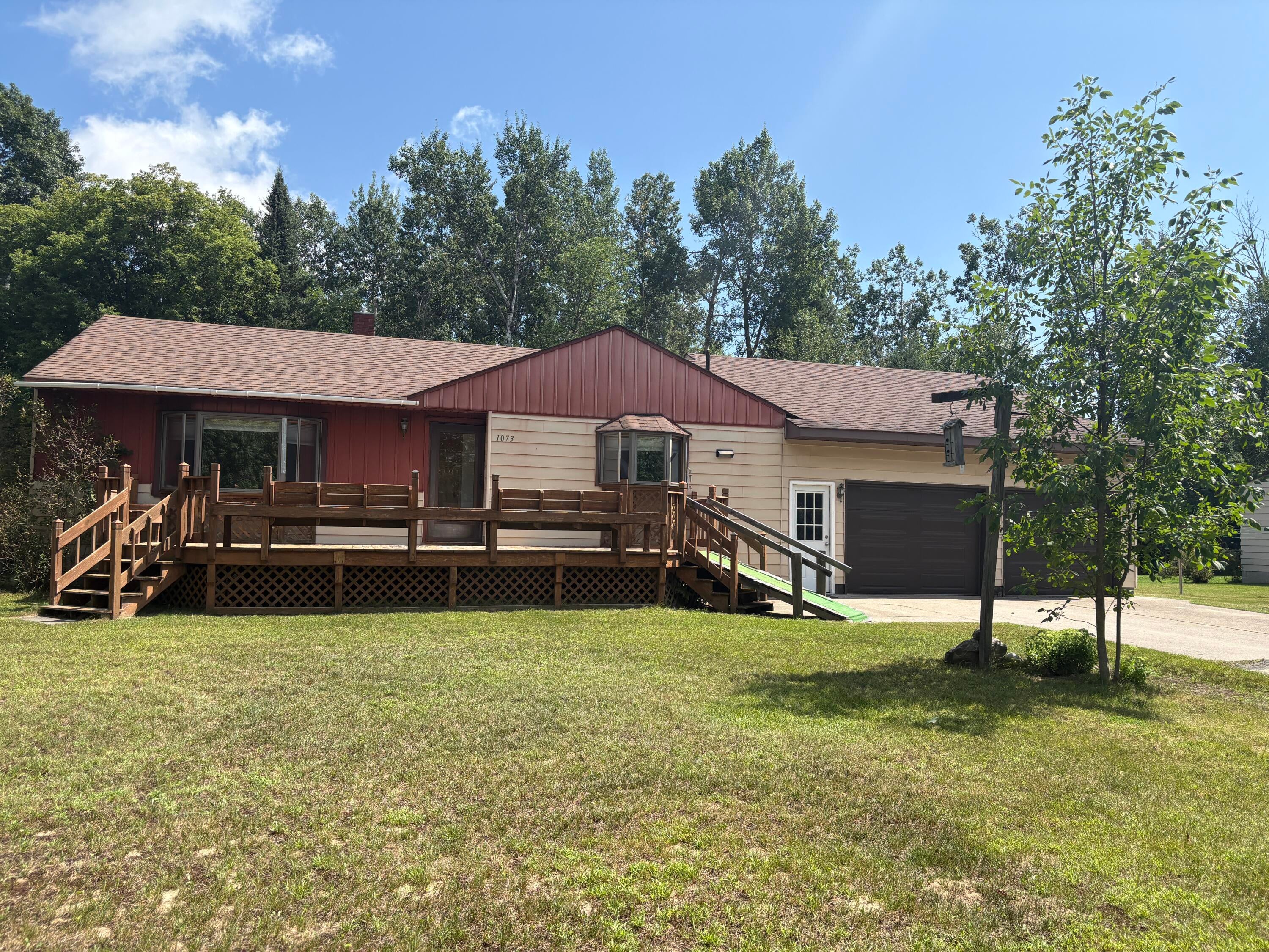 1073 Lake Winyah Road Alpena, MI 49707 - Photo 1 of 16 Front View