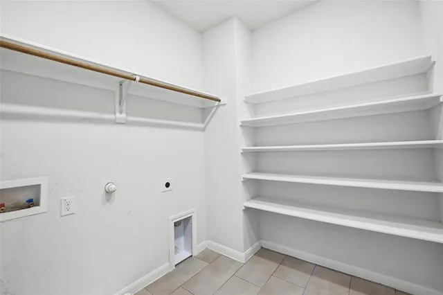 a view of an empty walk in closet