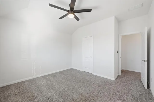 a work room with furniture and windows