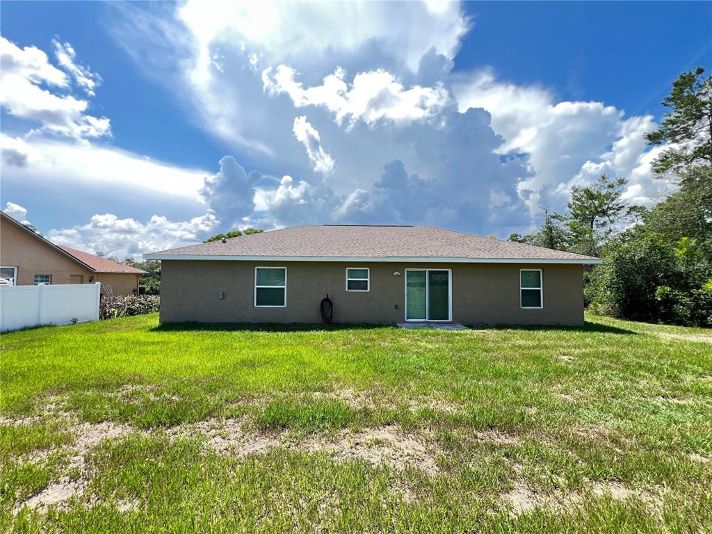 2427 Southwest 168th Loop Ocala, FL 34473 - Photo 5 of 21 a house view with backyard space