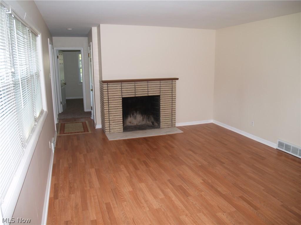 5587 Pepperidge Road Clinton, OH 44216 - Photo 3 of 18 Living Room w/wood burning fireplace