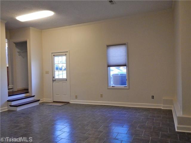 310 Kirk Road Greensboro, NC 27455 - Photo 11 of 16 Bonus. Downstairs bonus is ideal for many uses.