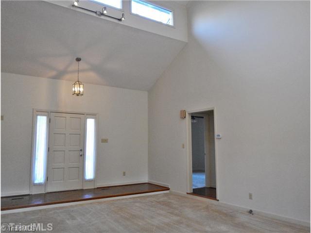 Den/Family/Great Room. The Great Room has a vaulted ceiling & clerestory windows along with spot & recessed lighting.