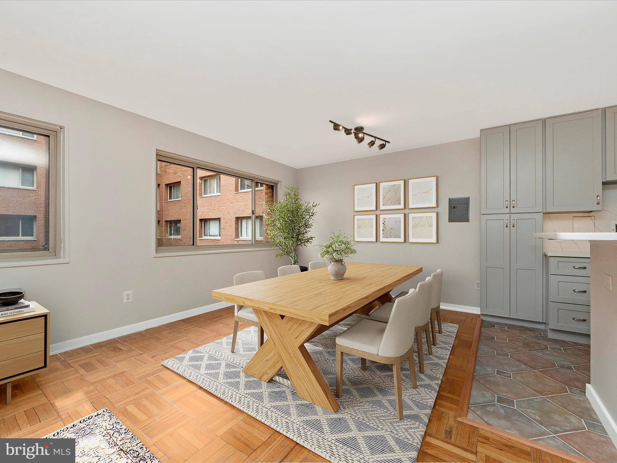 3900 Tunlaw Road Northwest, Unit 104 Washington, DC 20007 - Photo 10 of 36 Virtually Staged Dining Area