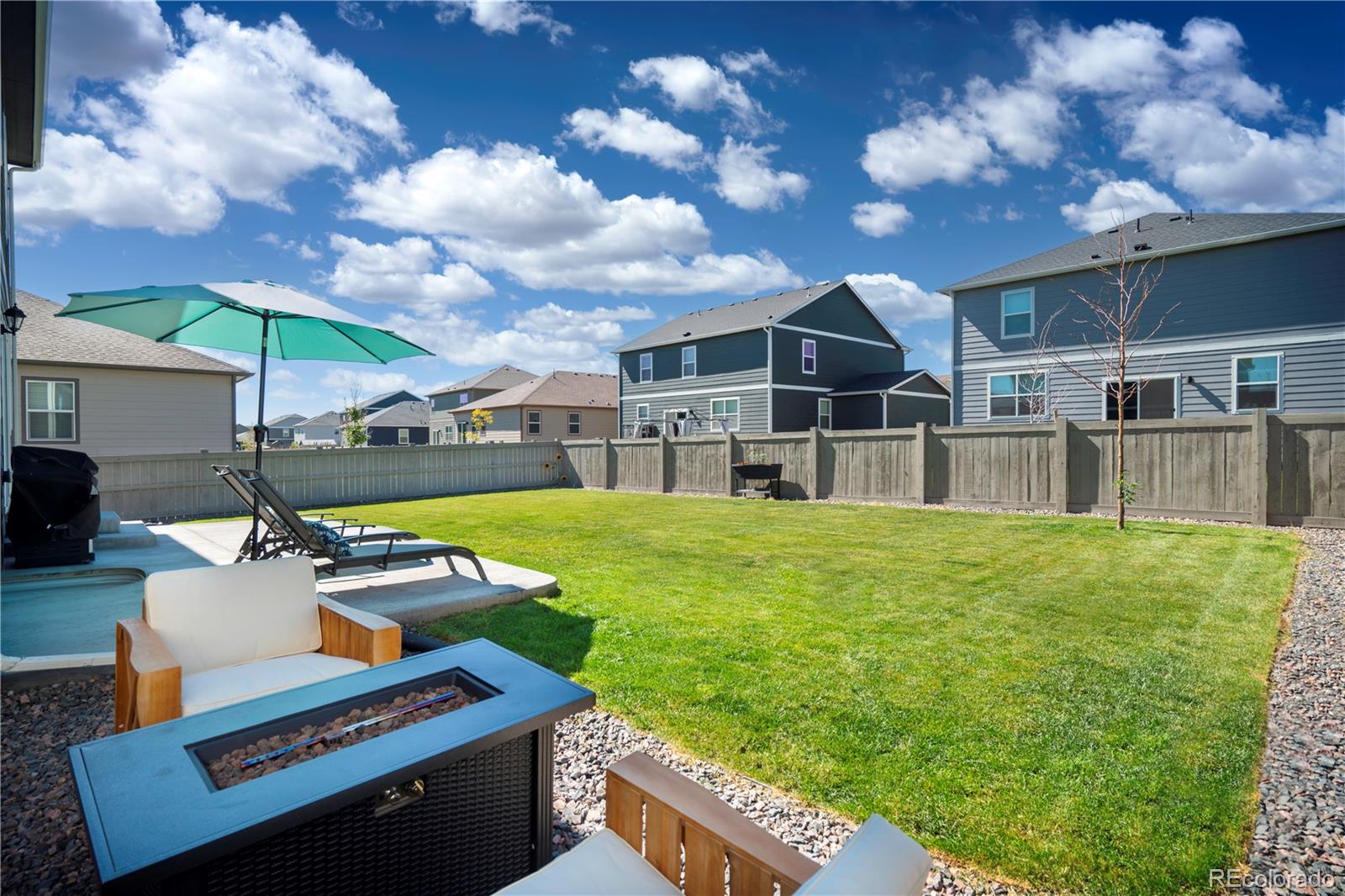 1521 Sun River Road Berthoud, CO 80513 - Photo 20 of 23 a view of an house with backyard porch and furniture