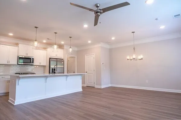 a table room with furniture and window