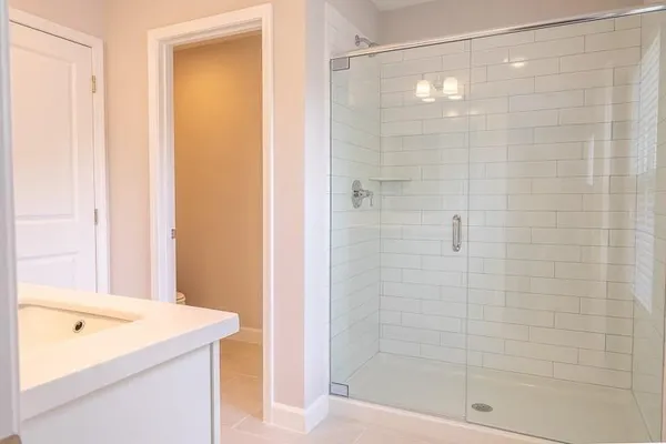 a bathroom with a sink a vanity and a mirror