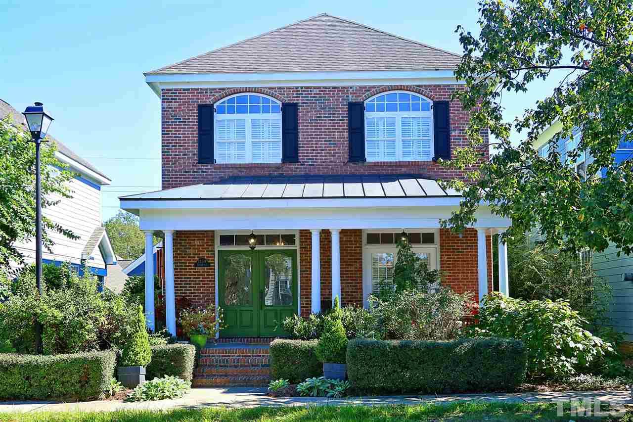 1164 Harp Street Raleigh, NC 27604 - Photo 1 of 25 a front view of a house with garden
