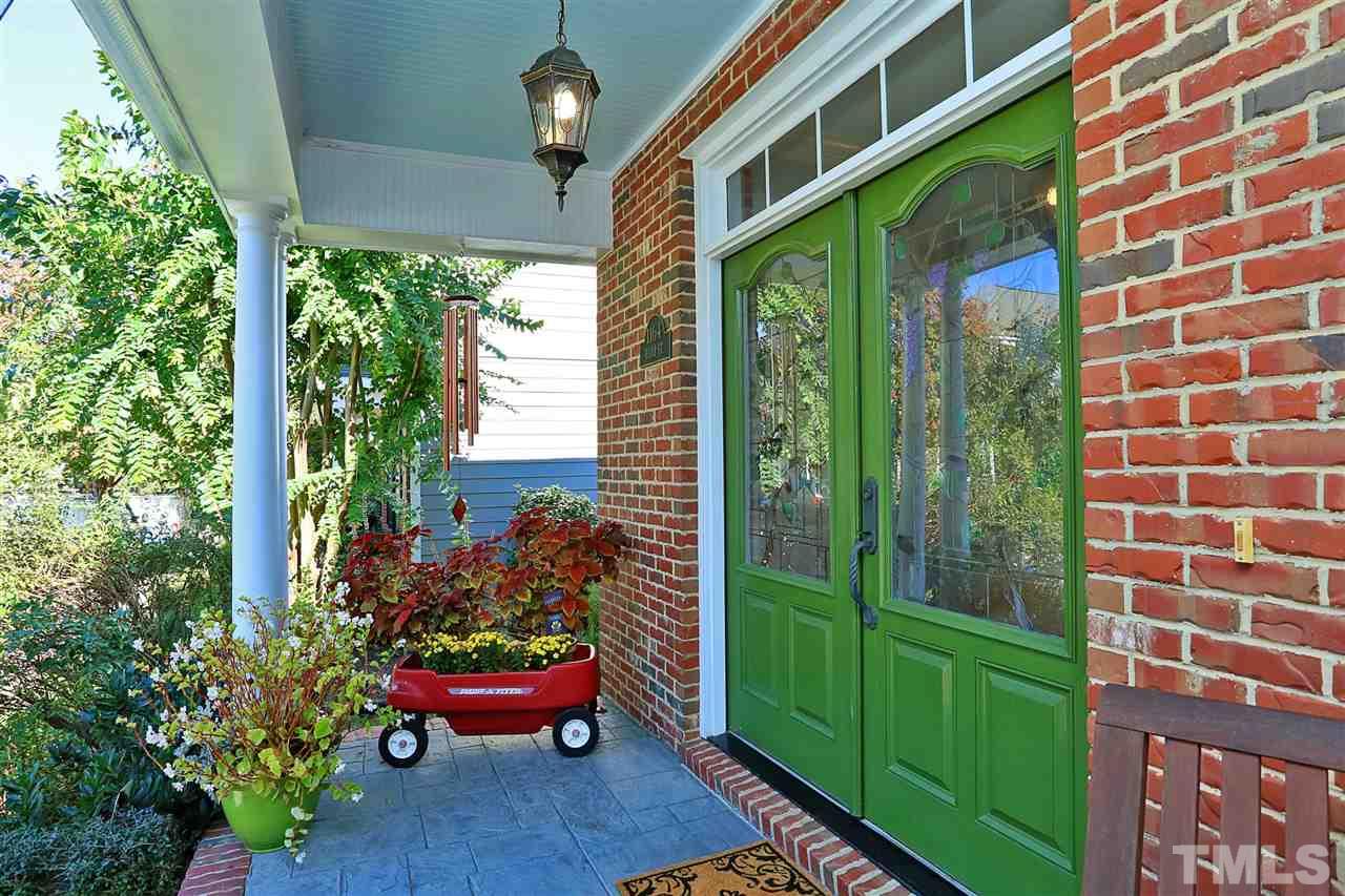 1164 Harp Street Raleigh, NC 27604 - Photo 2 of 25 a view of a porch with furniture and a yard