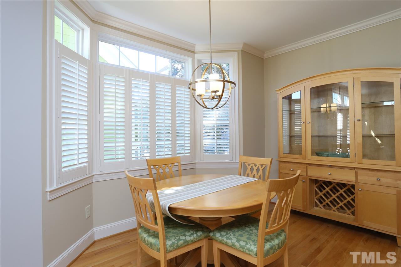 1164 Harp Street Raleigh, NC 27604 - Photo 11 of 25 a dining room with furniture and a window
